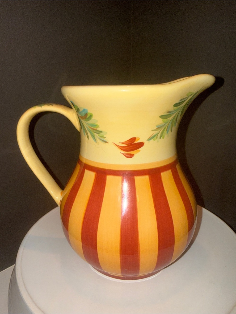 Hand-Painted Yellow Ceramic Pitcher with Orange Stripe Accents